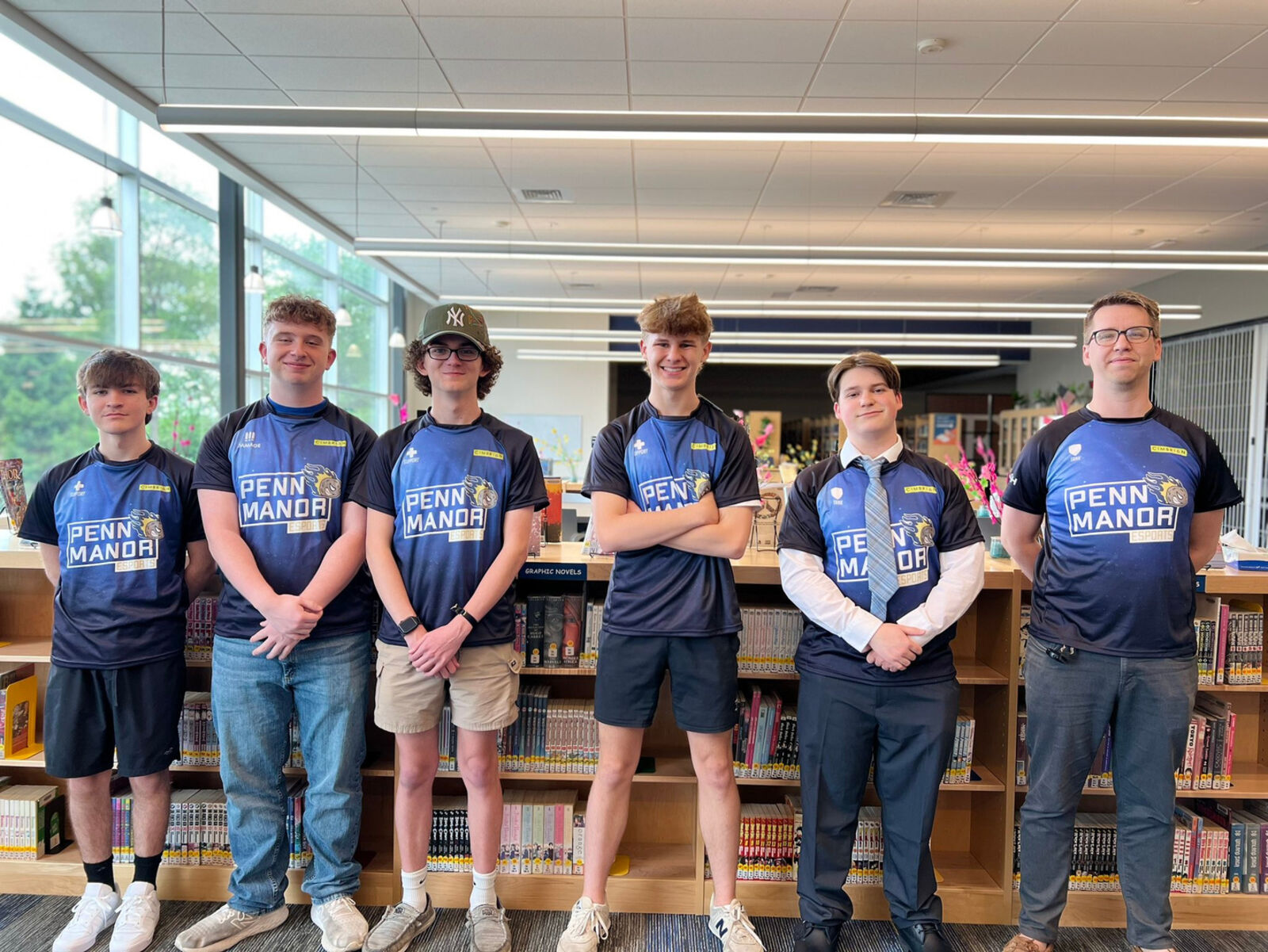 A high school esports team photographed at their school